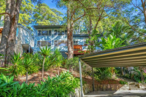 Beachside retreat with lush green views